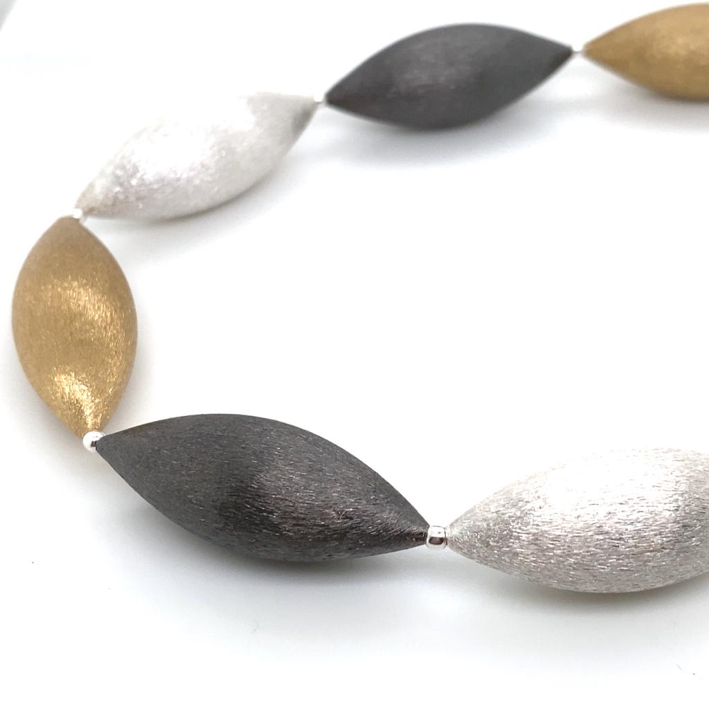 Silver, gold plated and oxidised necklace
