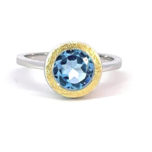Silver, gold plated blue topaz ring