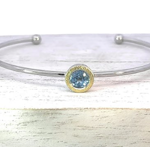 Silver, gold plated blue topaz bangle