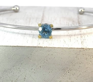 Silver, gold plated blue topaz bangle